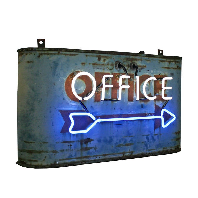 Point the way with this incredible blue and white neon sign. The original paint and construction are all in place, but we have restored the neon to full glory so that it will glow for many more years to come. Perch this sign on your desk or mount it