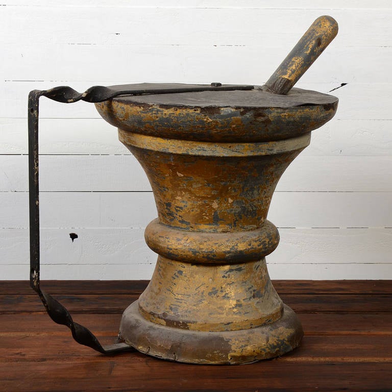 You may not be mixing your own poultices or tonics, but no matter: the pharmacist is in! This wonderful antique mortar and pestle would have been mounted outside an apothecary in the late 1800s, telegraphing the shop's purpose to the literate and