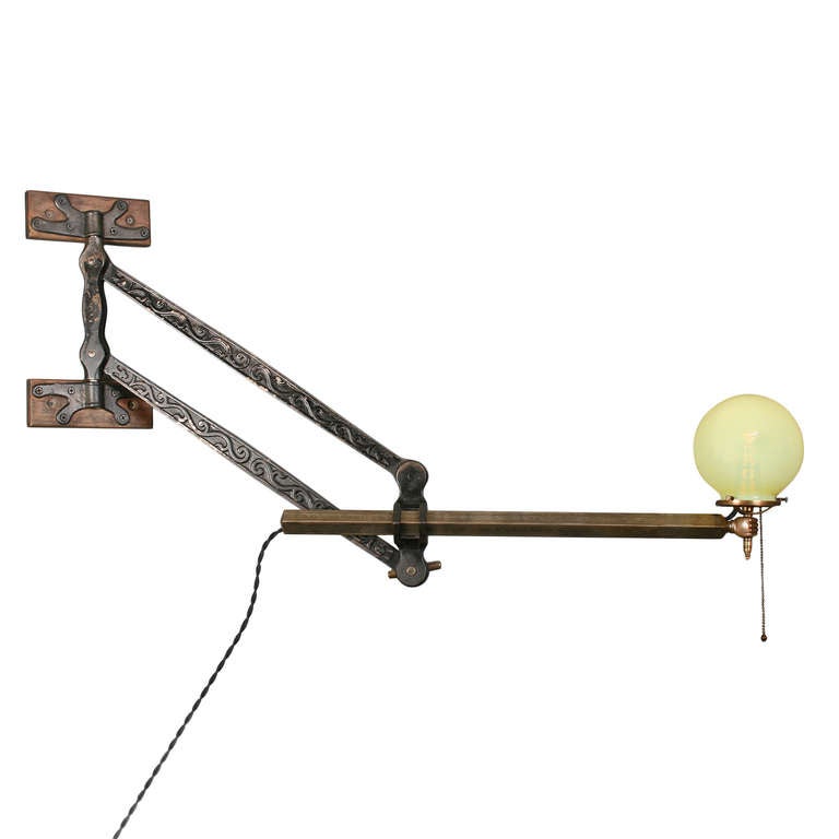 Industrial Adjustable Figural Hand Bracket Lamp with Straw Opal Shade, circa 1900