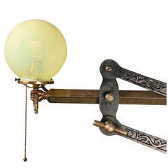 Adjustable Figural Hand Bracket Lamp with Straw Opal Shade, circa 1900