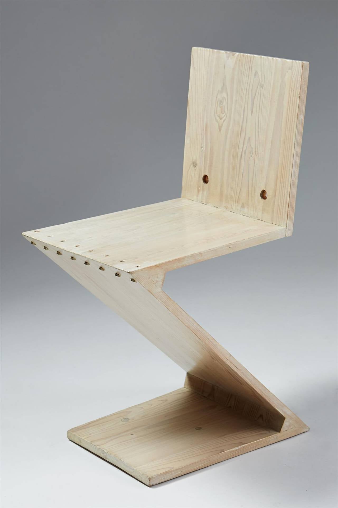 Chair, zig zag in stained pine. Designed by Gerrit Rietveld for G. A. van de Groenekan, Holland, 1934.
These example from circa 1960.One chair available.

Provenance: The architect Han Schröder, daughter of Truus Schröder, and also Rietveld's