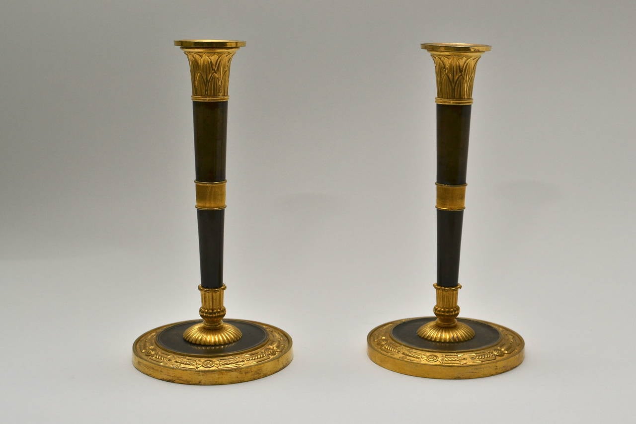 Pair of gilt bronze French Empire candlesticks attributed to Galle, Paris, circa 1805.