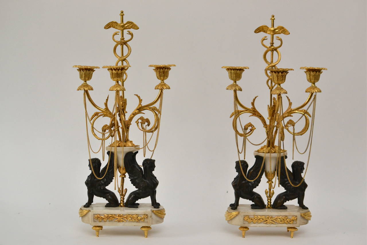 Pair of Neoclassical Gilt and Patinated Bronze and White Marble Candelabra