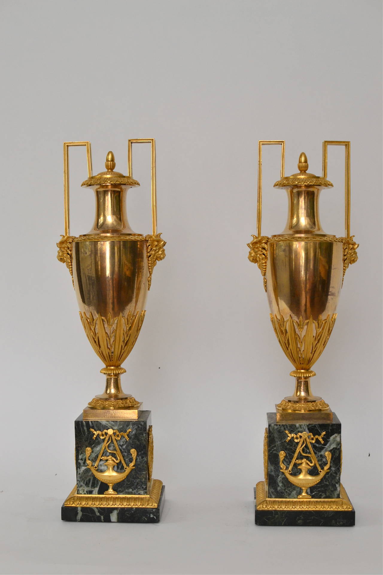 A fine pair of Empire gilt bronze and marble vases, Paris, circa 1810.