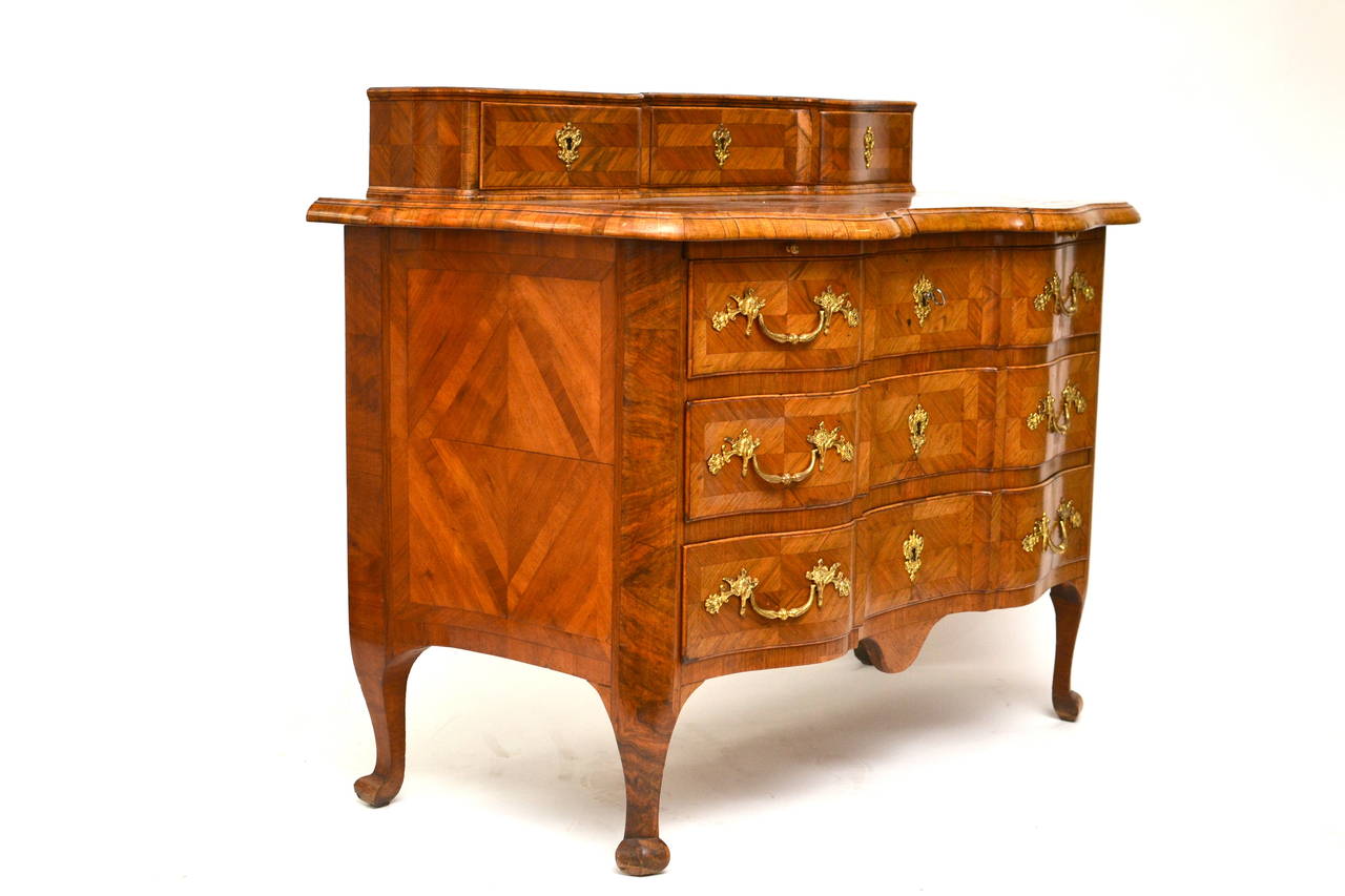 A Swedish barock chest of drawers Signed three times on the back by Johan Furloh, Stockholm. Furloh worked 1724-45. This commode is in a very good condition with original gilt bronze mounts and handles including original locks. It´s veneered with