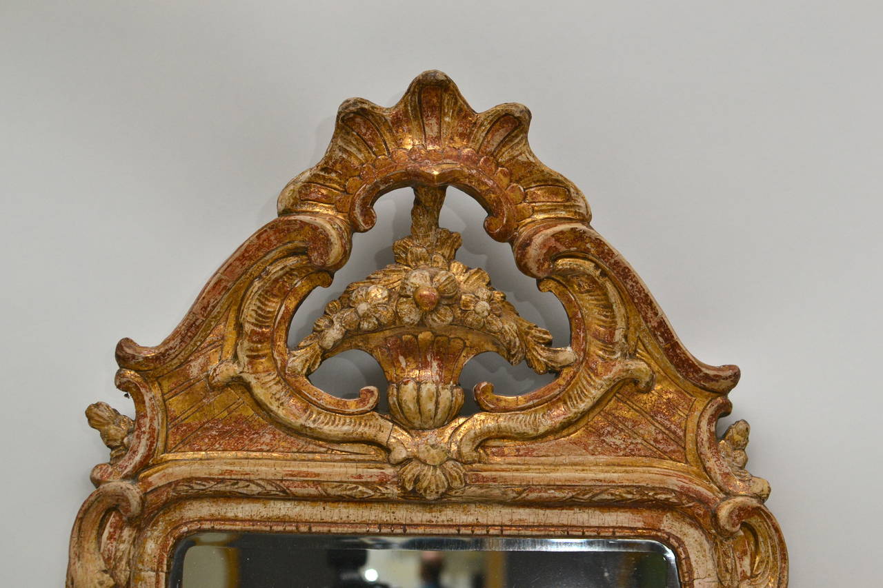 A Swedish Gustavian carved gilt wood mirror, signed by Jakob Helin Stockholm and dated 1776. Original condition and original mirror glass.