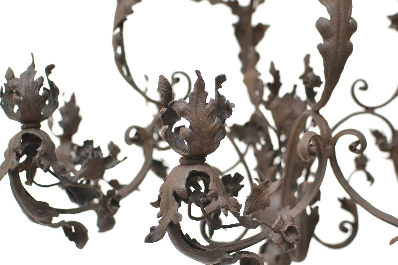 A wrought iron Rococo chandelier, 18th century, possibly German.