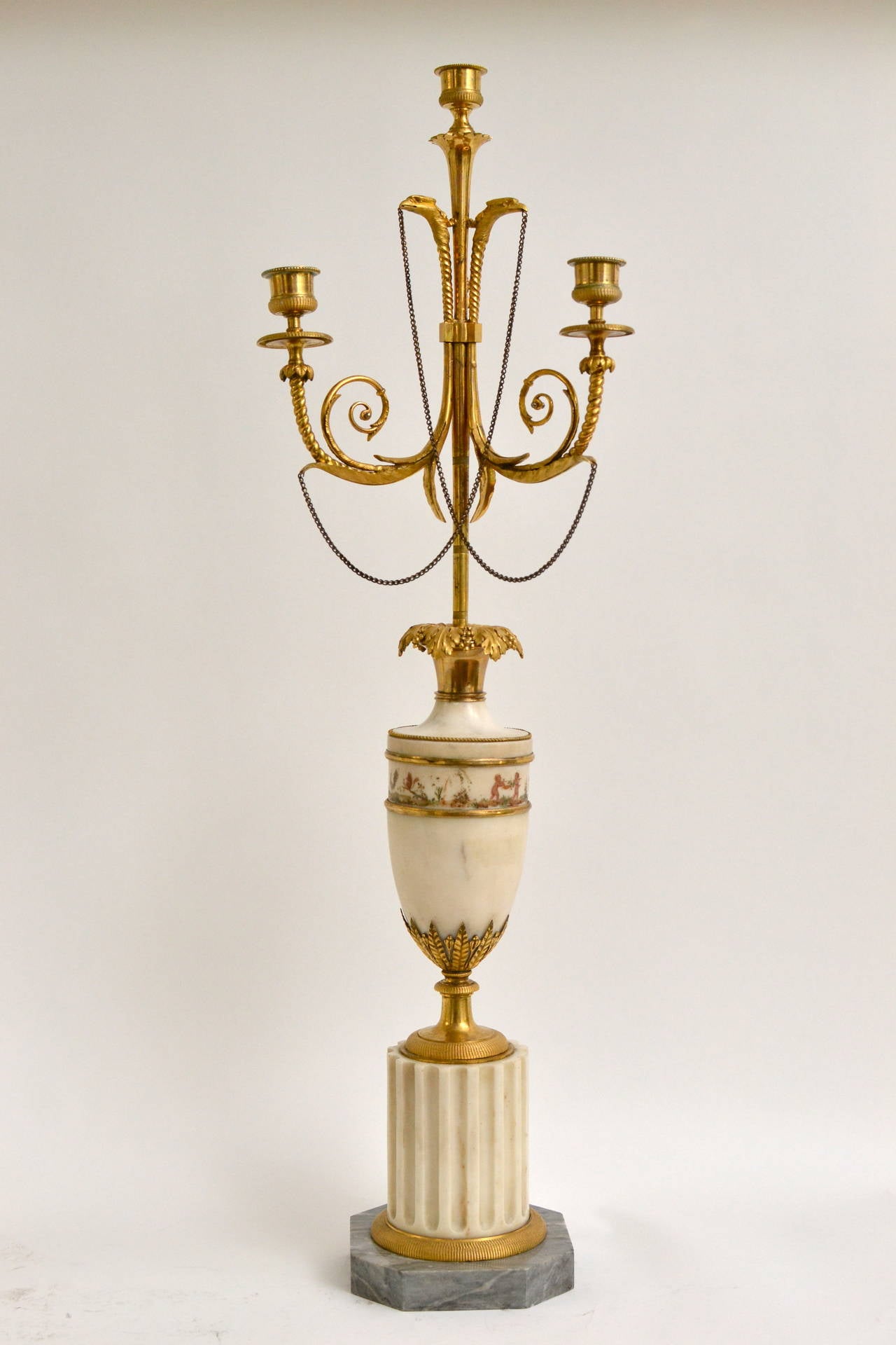 A pair of Directoire gilt bronze and marble candelabra, possibly German from, circa 1800.