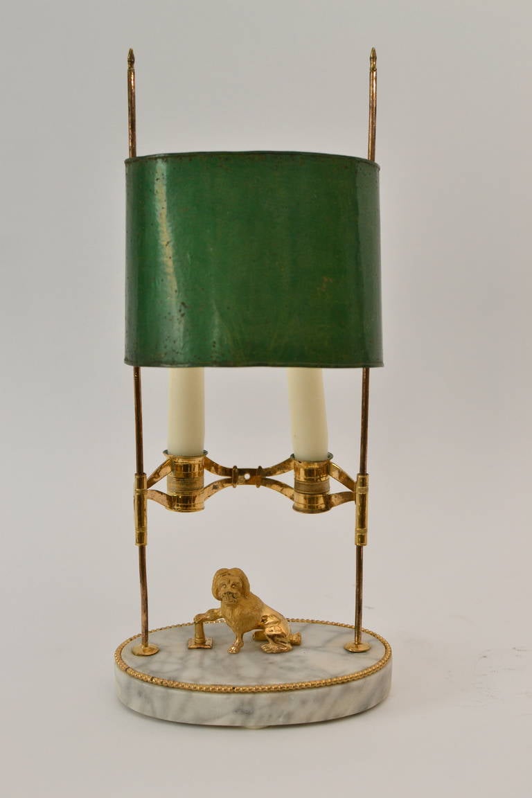 A Swedish late Gustavian Bouillotte Lamp, late 18th century. Gilt bronze mounts on a white marble base.