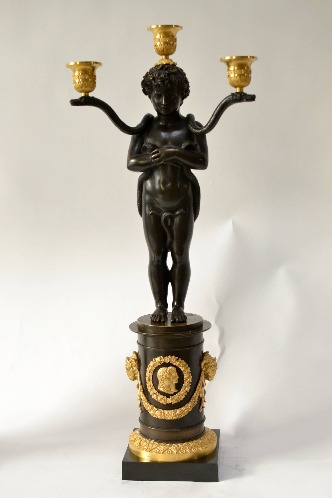 Pair of empire gilt and patinated bronze candelabra attributed to Pierre Chiboust, Paris, circa 1810-20. Chiboust or Chibout was working in Paris 1806-1824.