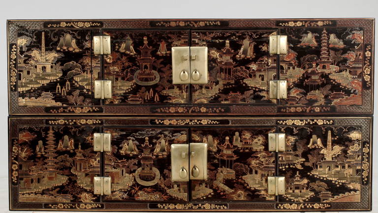 A pair of chinese lacquer cabinets from around 1900. It is two cabinets that can also be used on top of each other and create one cabinet.