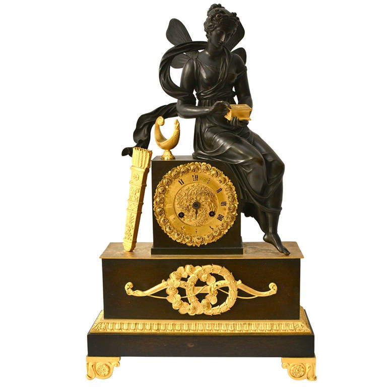 Empire Gilt Bronze and Patinated Mantel Clock at 1stDibs