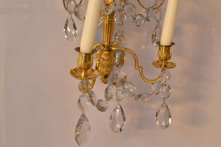 Louis XVI Pair of Russian gilt bronze and crystal wall appliqués.