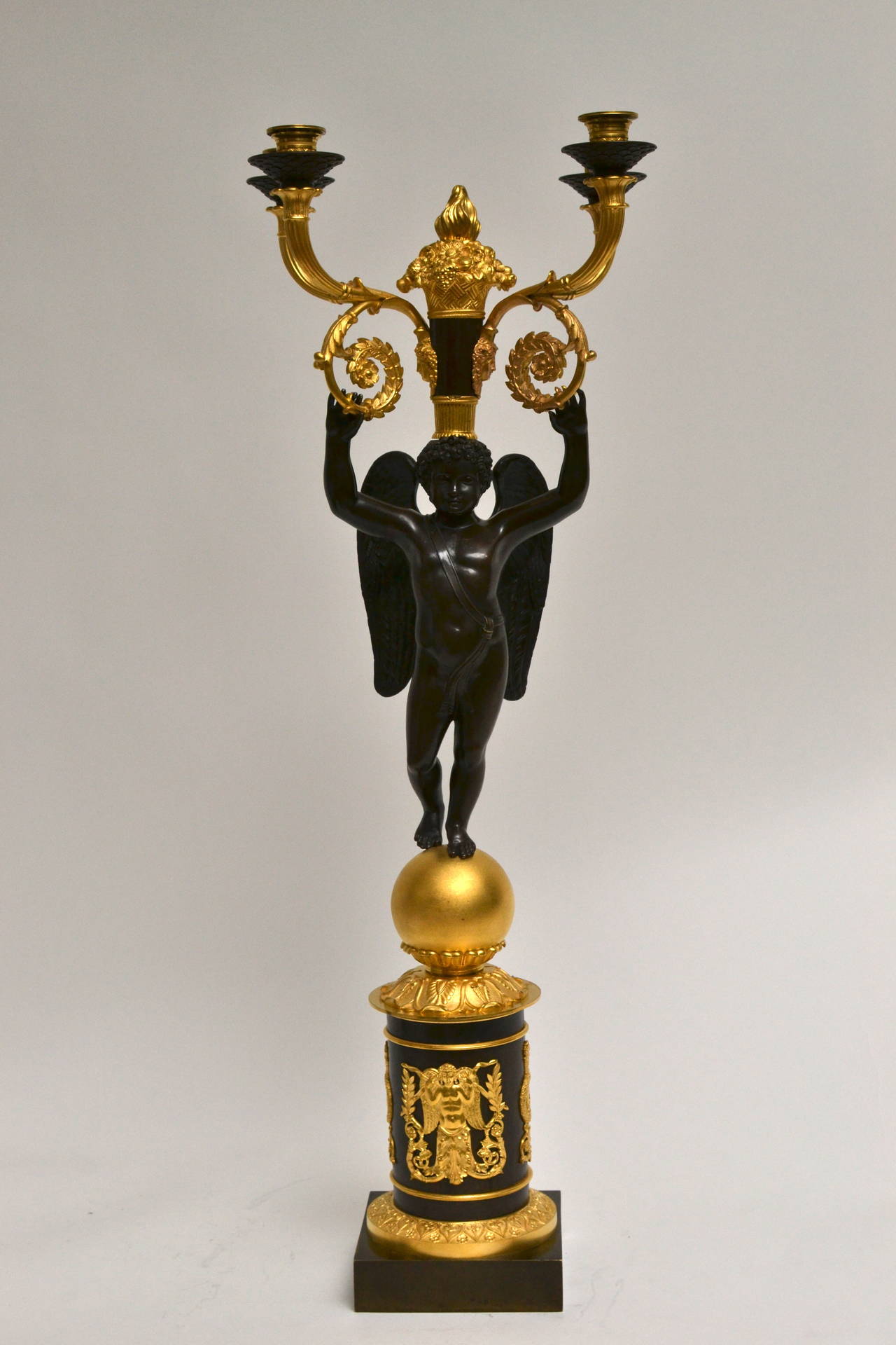 A large empire gilt bronze and patinated gilt bronze candelabra by Pierre Chiboust. Signed 