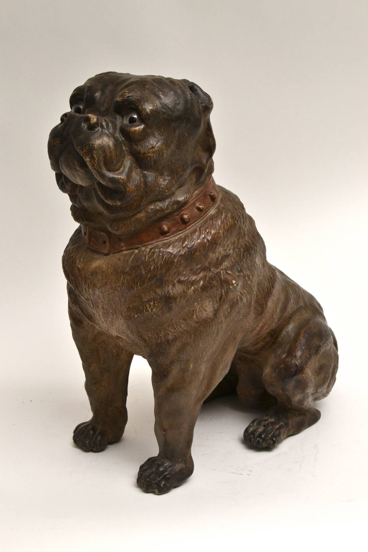 A large painted terracotta dog, late 19th century.