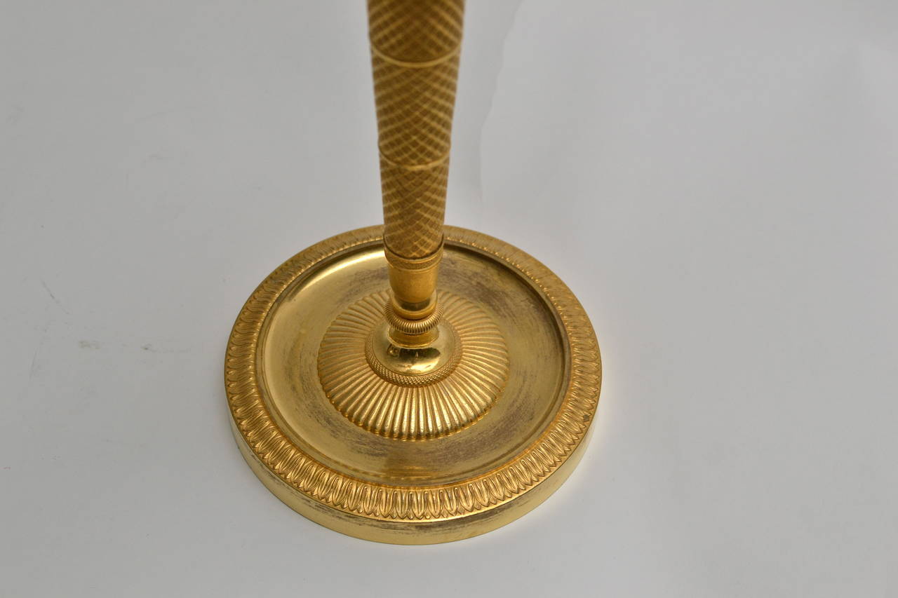 Gilt Pair of Empire gilt bronze candelabra
