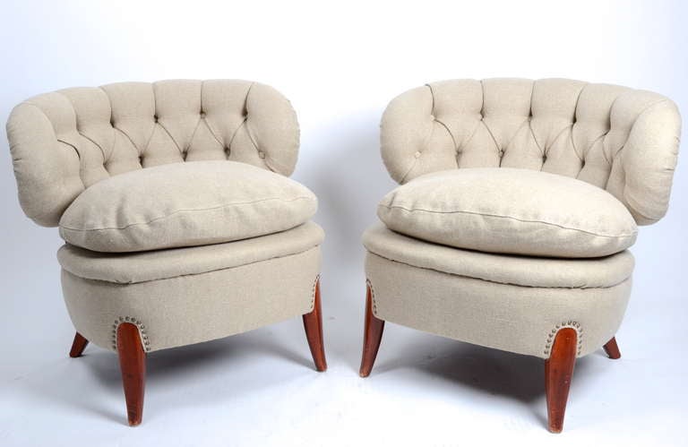 Large pair of chairs by Swedish designer Otto Schulz.

Recently reupholstered in a thick linen fabric.