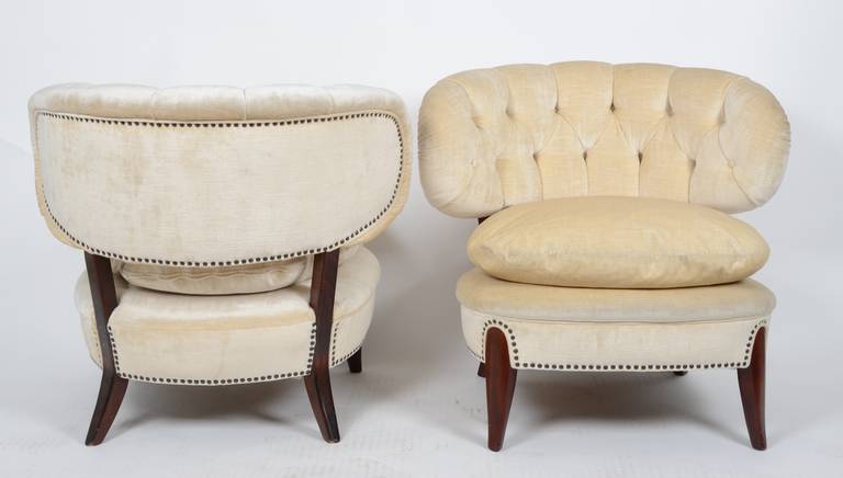 Large pair of chairs by Swedish designer Otto Schulz for Jio Möbler, Sweden, in the 1940's. 

The chairs are covered with velvet.