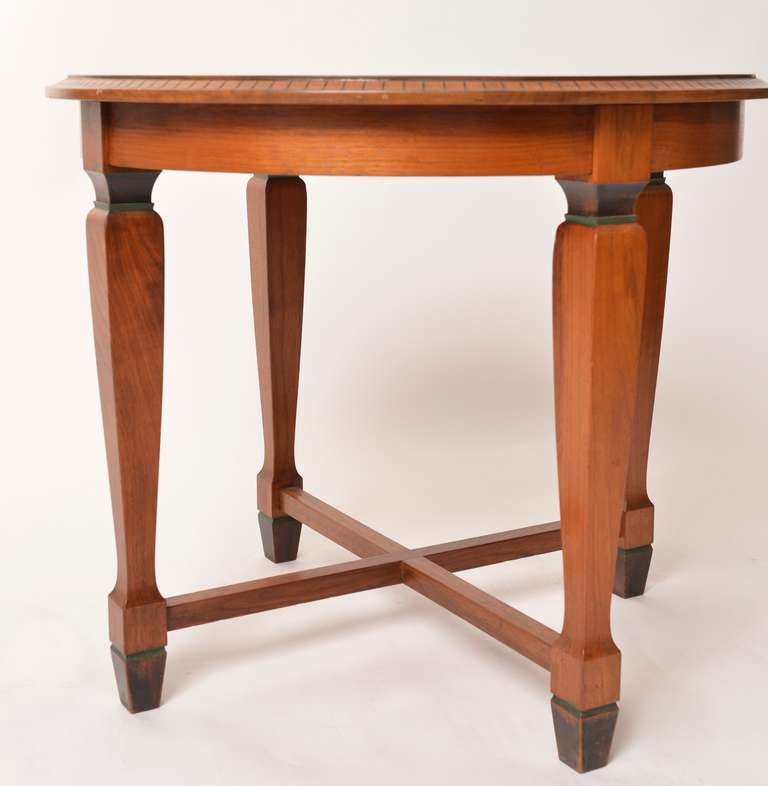 A 1920s table by the Swedish designer David Wretling. Walnut.

Diameter 27.6 inch/70 cm. Height 23.6 inch/60 cm.