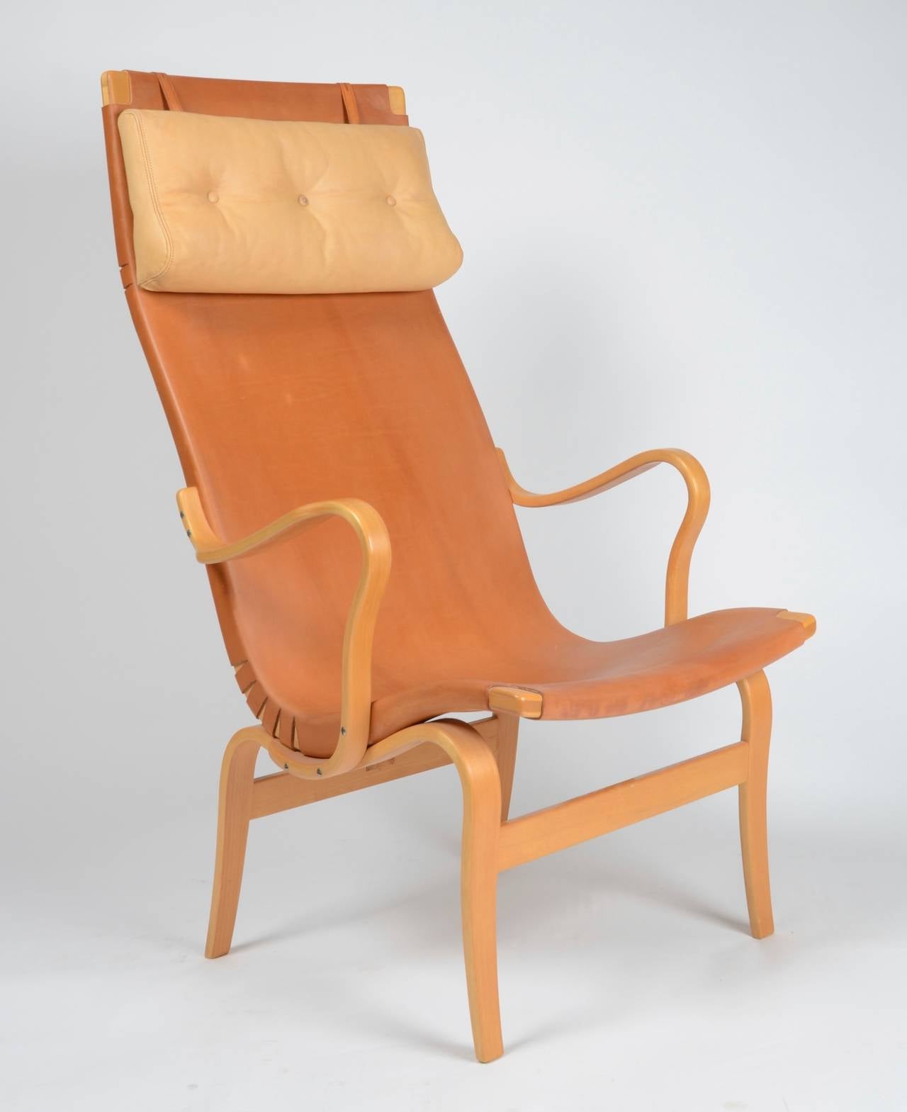 Armchair model high-back Eva with cognac leather, designed by Bruno Mathsson in 1934. Produced by Karl Mathsson, Värnamo Sweden. This example dated 1978.