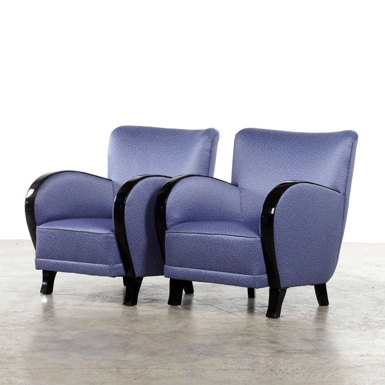 Pair of Swedish Art Deco armchairs with black polished armrest and leg. The chairs are newly upholstered in Lelievre- fabric, Sweden, circa 1930.