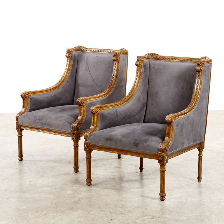 French armchairs, woodcut with elegant details.  
Original gilt with good patina. Louis XVI style. France circa 1860.
Newly re-upholstered with velvet.
One is SOLD!