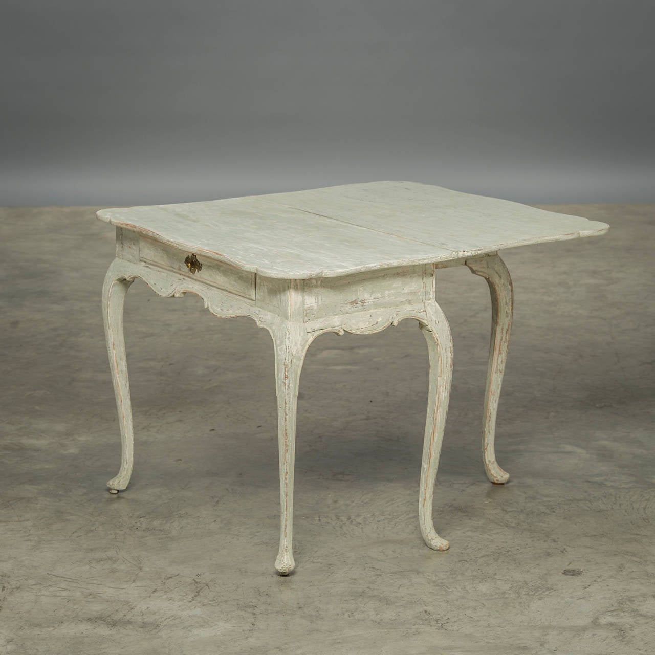 Danish Rococo play table about 1770. Grey/white color to complement the original color. 1 drawer and elegant curved legs.