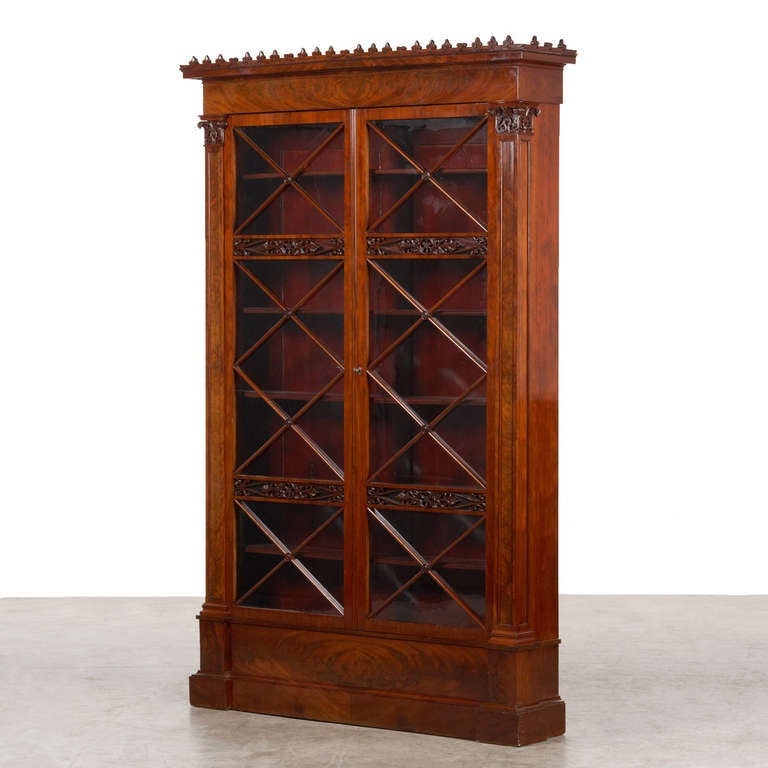 'Hetsch' glass-fronted bookcase/showcase in Cuban Mahogany 1830-1840. The bookcase is done with very high carpentry and cutting quality and presumably designed by Hetsch. It is a unique piece of furniture. G. F. Hetsch - Danish/German architect