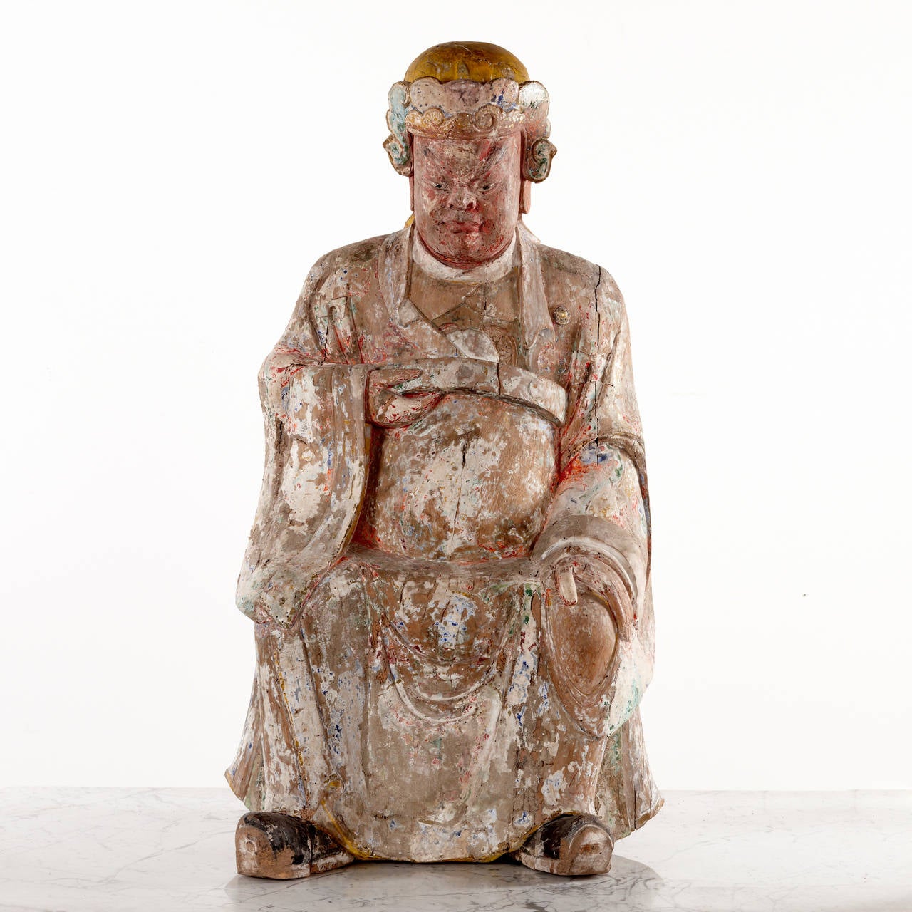 Large (98 cm) woodcut official figurine with remaining pieces of polychrome lacquer. Occur untouched with great patina. From early 19th century. The figure is originated in the province of Shanxi.