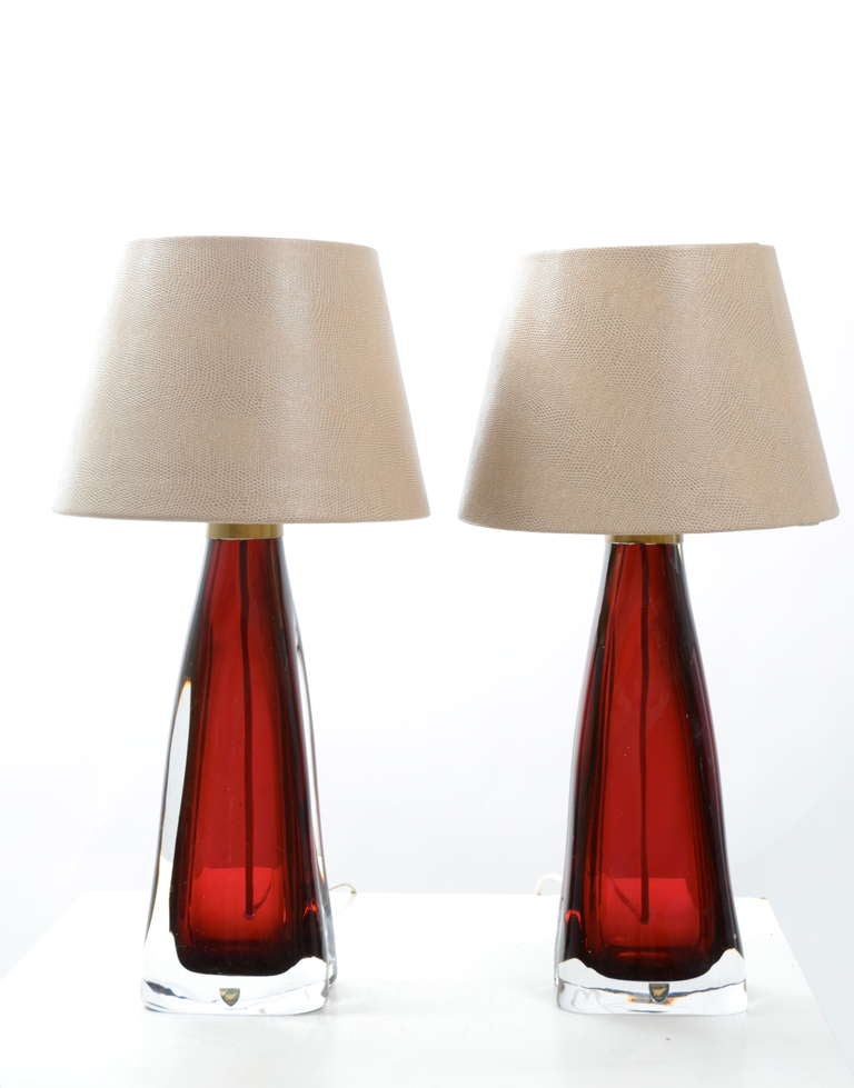 pair of Carl Fagerlund lamps
in the graal maner where colored glass is encased in another layer of colorless transparent glass
manufakturer Orrefors 1950s 
height with sockets 38 cm
lampshade not included