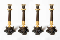 A set of four Charles X Candlesticks