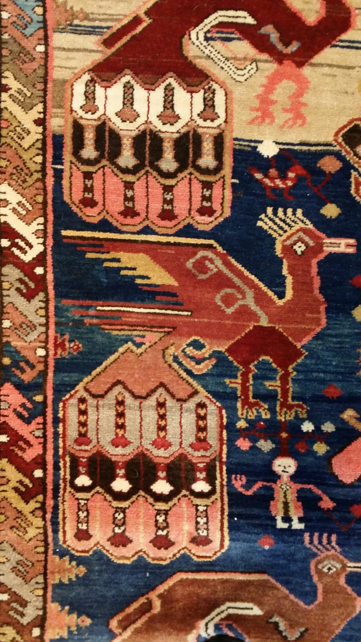 Ingush small tribe (Sunni) living in Daghestan in NE Caucasus. Design: Variegated blue ground with large, decorative peacocks ect. This rug has hung horisontally all it's life ( see rings on the reverse ) , so it is top condition. Warp: Z2S plied (
