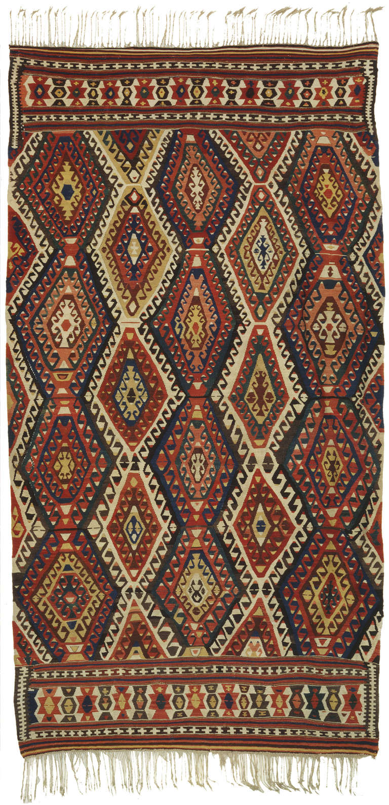 South Anatolian kilim, possibly from the Mut area. Ivory wool warps Z2S. Wool weft. Organic dyes. Good condition - very slight repair. Woven in one piece. It has large slits and a floppy handle.