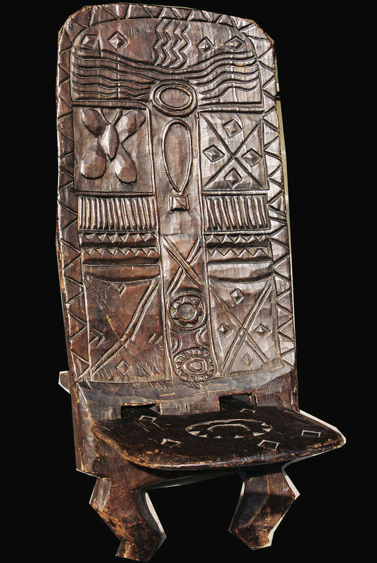 Reclining stool. Executed according to Baulé fashion but was probably sculpted by an unknown tribe in Liberia. Rel. light wood with an even brown patina. 
Provenance: a Swedish traveller to Liberia acc.the stool in the 1960s. Good condition. Made