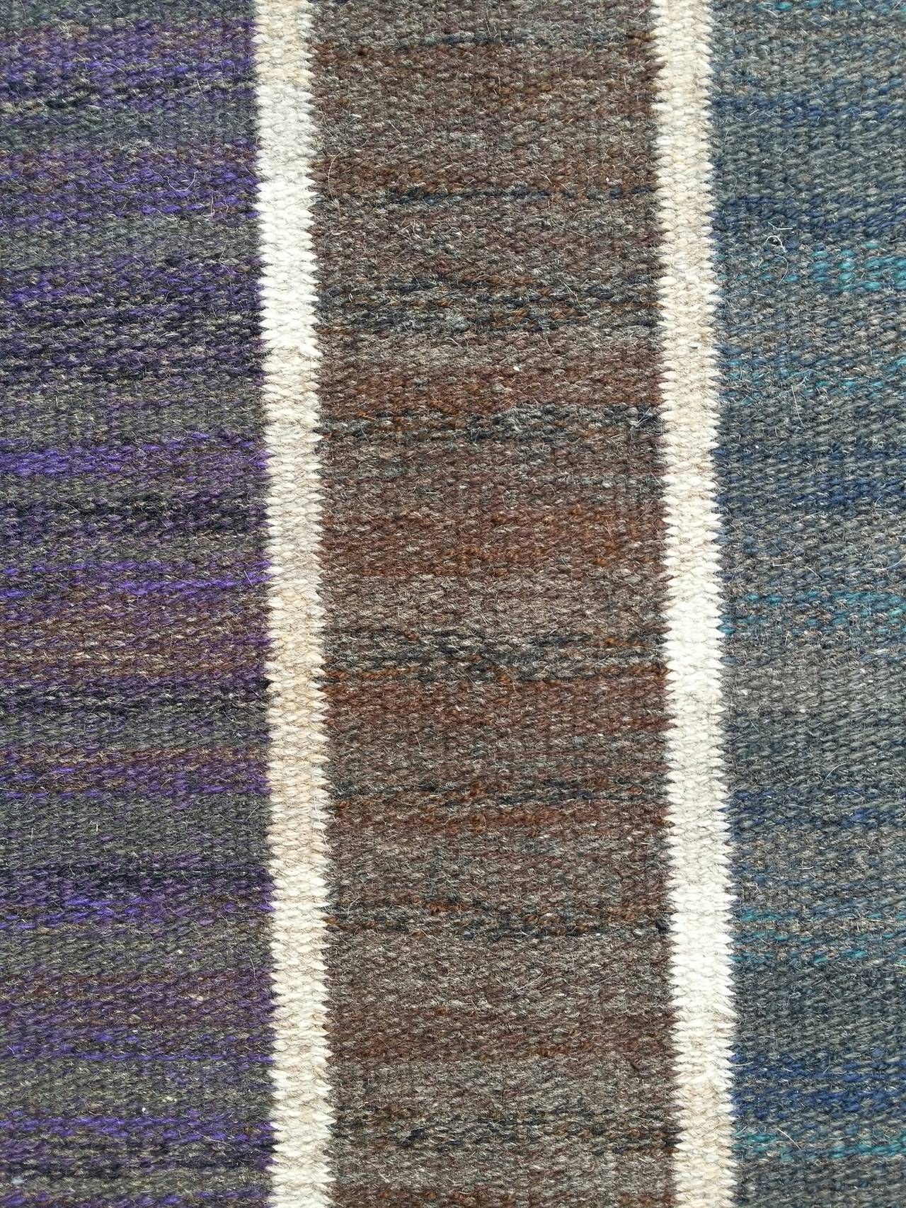 Swedish flatwoven rölakan rug,designed by irma Kronlund. Executed  by Kroniberg Läns Hemslöjd. Signed: IK KLH. Warp: linen yarn,light beige,ca. Z5S. Patterning weft: wool,Z4 spun. Condition: very good,cleaned ,stopped ends.