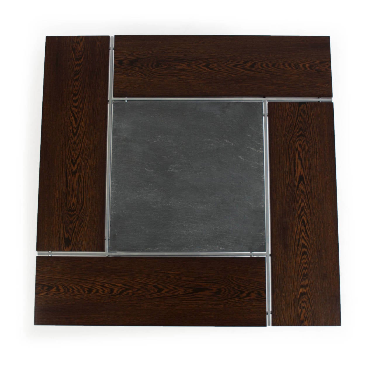 A square coffee table with top of wengé and slate, frame of matt chromed steel.

Designed by Preben Fabricius & Jørgen Kastholm 1960's and manufactured by Bo-Ex, Denmark as model BO 750.