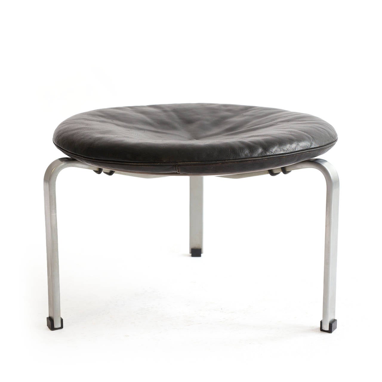 Poul Kjærholm stool model 'PK 33,' steel frame and cushion of original black leather. 

Designed 1958, manufactured and marked by E. Kold Christensen.

Fine condition and patina.