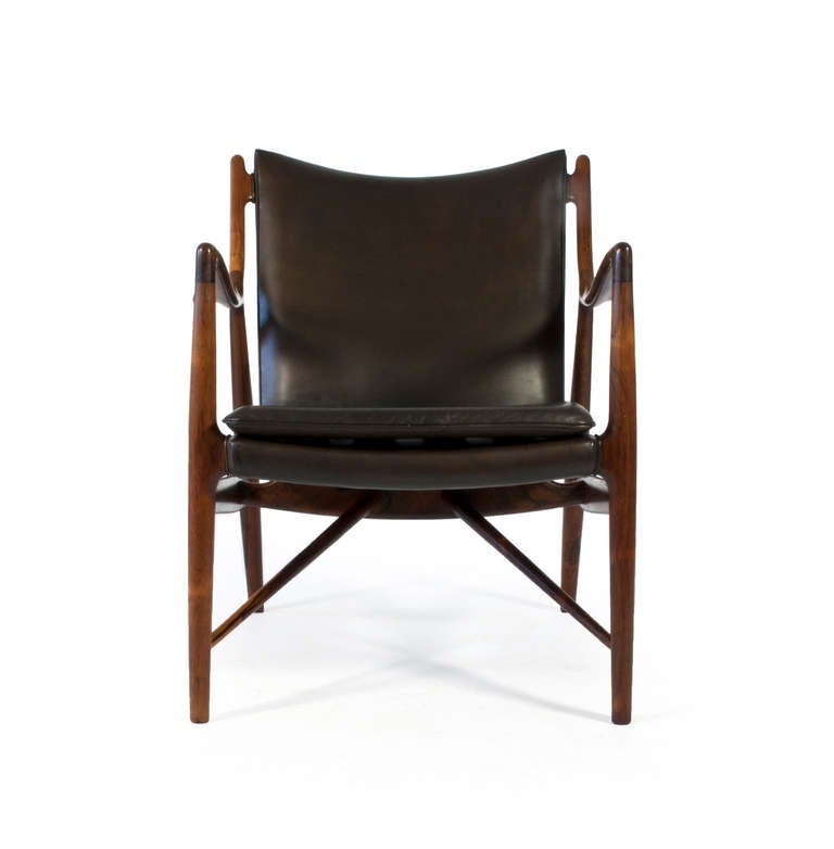 Finn Juhl NV45 armchair in Rio Rosewood, upholstered with patinated black-dyed natural leather with a beautiful black-brownish patina

Designed by Finn Juhl 1945 and executed by cabinetmaker Niels Vodder, Denmark. 

The rosewood frame has rich