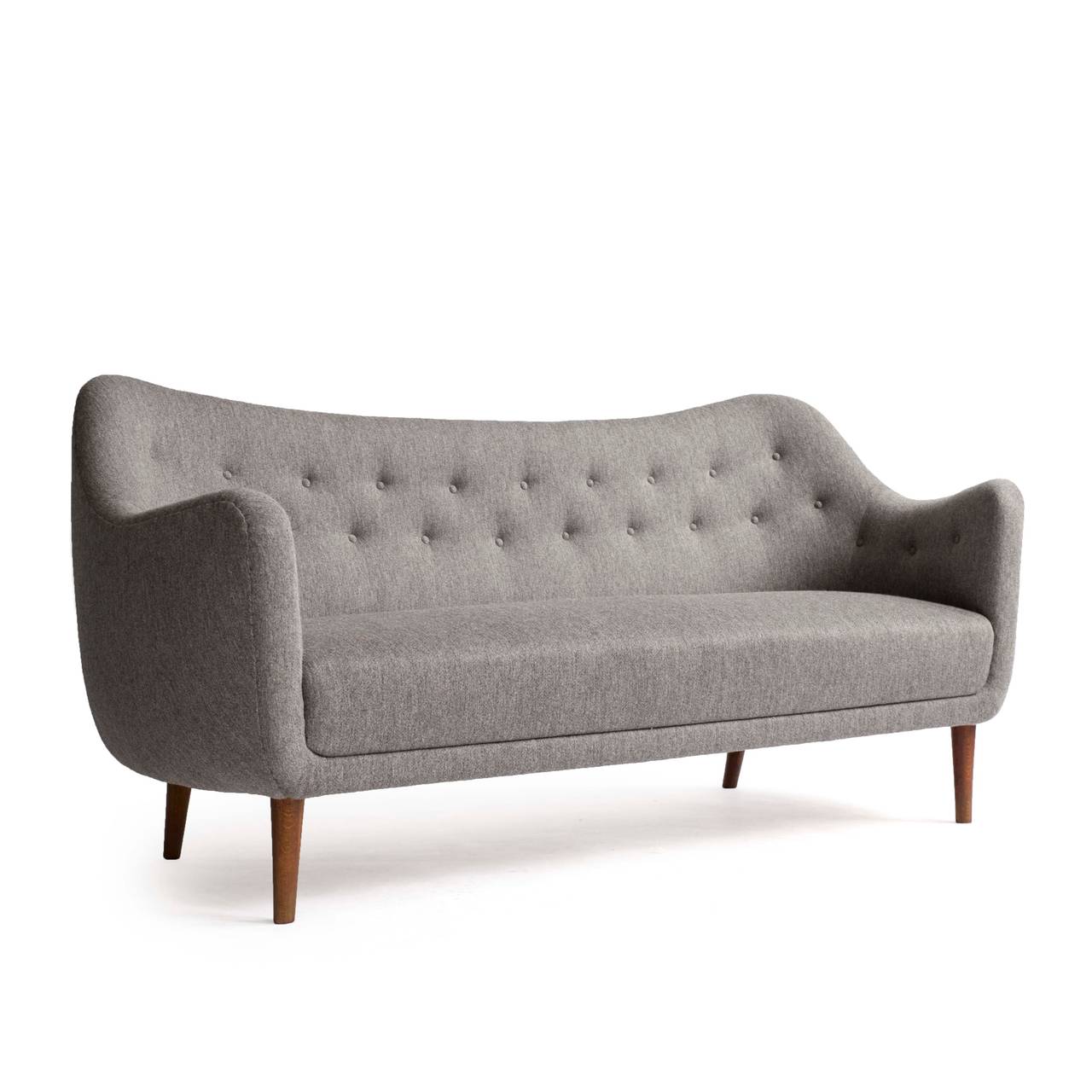 Finn Juhl 2, 5 - 3 person sofa upholstered with grey wool, tapering legs of stained beech. 

Designed by Finn Juhl 1948 and manufactured in the 1950s by Bovirke Denmark, model BO64. 

A rare sofa in excellent condition.