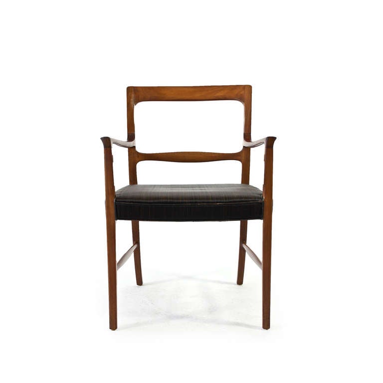 Ole Wanscher mahogany armchair, seat upholstered with original black/brown horsehairs. 

Designed 1954 and manufactured by cabinetmaker A. J. Iversen. 

Good condition. 

Pair available upon request.