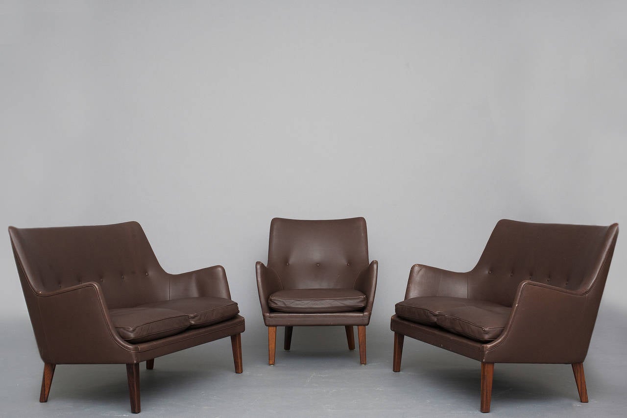 Pair of sofas and lounge chair by Arne Vodder for Ivan Schlechter.
Brown leather and rosewood.
Nice vintage condition.