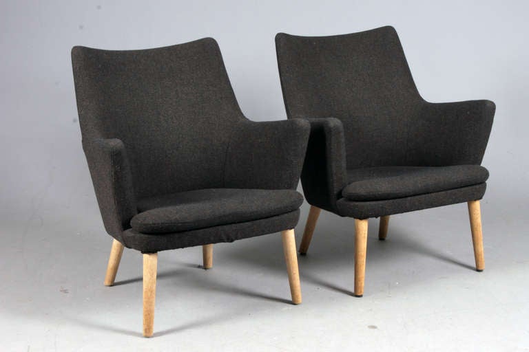 Pair of Lounge chairs by Hans J. Wegner for AP Stolen.
Oak & gray wool upholstery.
Nice used condition.