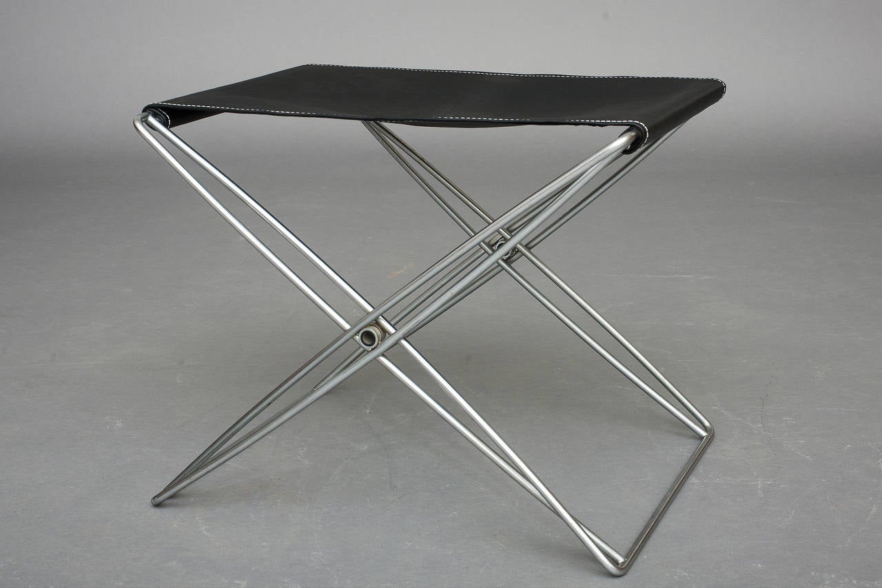 Folding stool by Jorgen Gammelgaard.
Designed for Design-Forum.
Awarded with the furniture price, 1971.
Steel and leather.
Nice vintage condition.