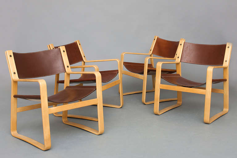 Mid-Century Modern Set of Four Lounge Chairs and Coffee Table by Hans J. Wegner for Johannes Hansen.