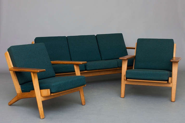 Pair of Lounge chairs & 3-seater sofa by Hans J. Wegner for Getama.
Model: GE 290
Oak, cushions with wool upholstery.
Nice vintage condition.