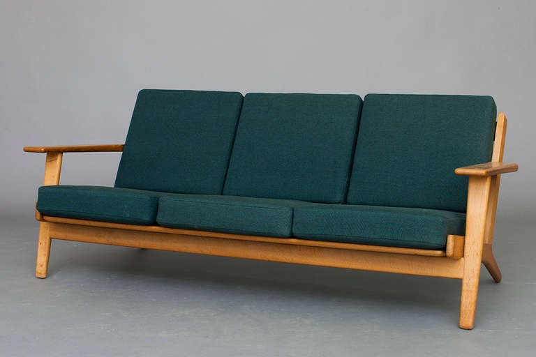 Mid-Century Modern Pair of Lounge Chairs and Three-Seat Sofa by Hans J. Wegner for Getama