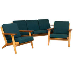 Pair of Lounge Chairs and Three-Seat Sofa by Hans J. Wegner for Getama