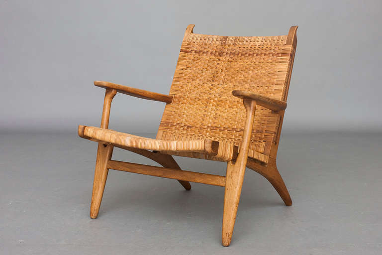 Lounge chair by Hans J. Wegner for Carl Hansen & Son.
Model: CH 27
Oak & cane.
Nice vintage condition with patina.