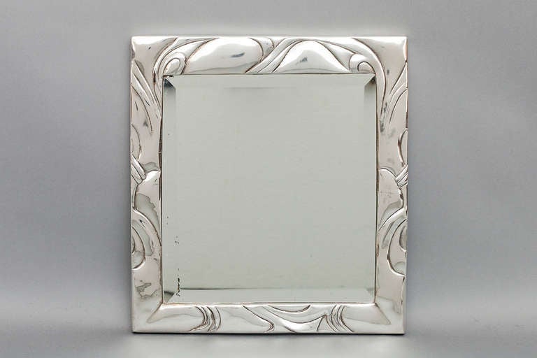 Mirror by Hans Peter Hertz & Mogens Ballin.
Silver-plated pewter
Marked:
HB
73 Danmark 
1819.
Art Nouveau.
Nice condition.