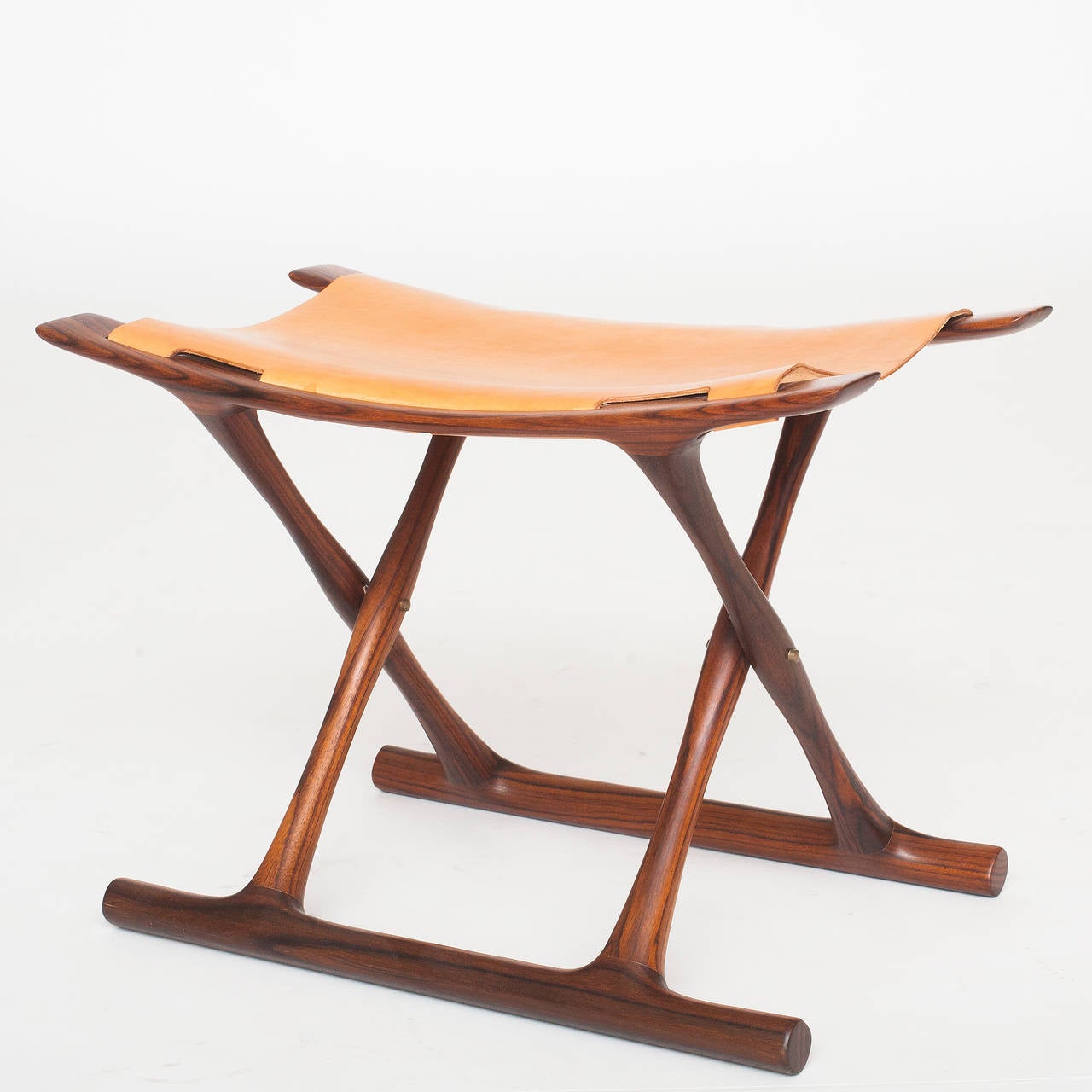 Egyptian stool in Sonokeling rosewood with original cognac leather.

Period: 1930-1939